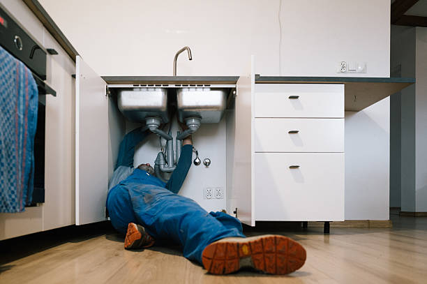 Professional Drain Cleaning technician working in West Des Moines, IA